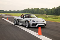 Chloe Chambers driving Porsche 718 Spyder for Guinness World Record in slalom