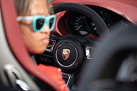 Chloe Chambers driving Porsche 718 Spyder for Guinness World Record in slalom