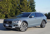 The new 2022 Volvo V90 Cross Country B6 AWD looks good in this park setting.