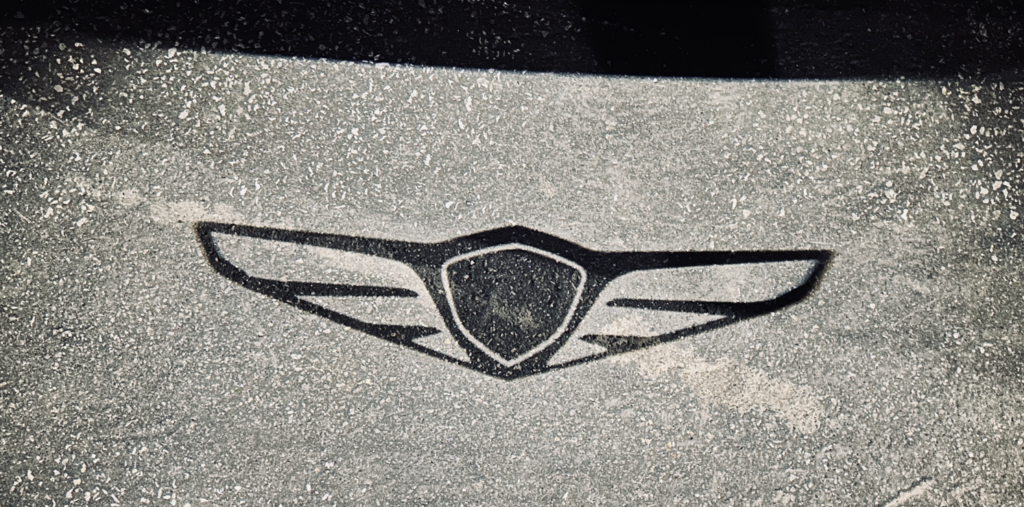 2025 Genesis GV70 3.5T - Approach lighting with Genesis logo