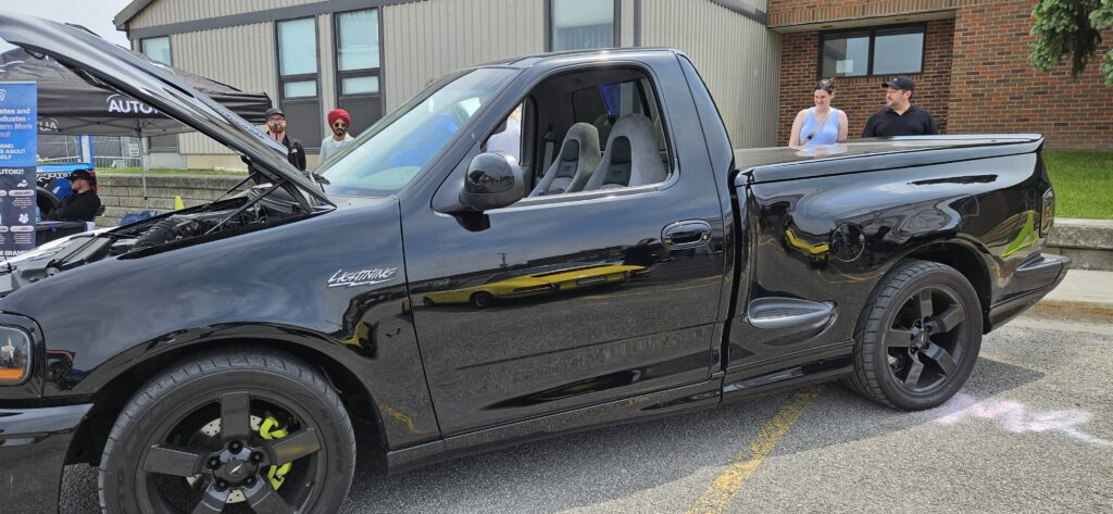 Side View Of Ford Lightning On Display At The Auto Show