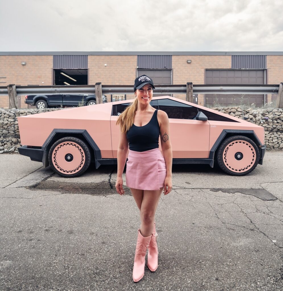 Christel In Front Of Pink Tesla Cybertruck