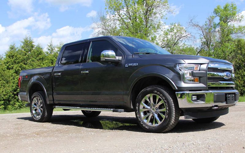 The Ford F-150 Lariat 4x4 SuperCrew is covered in chrome.